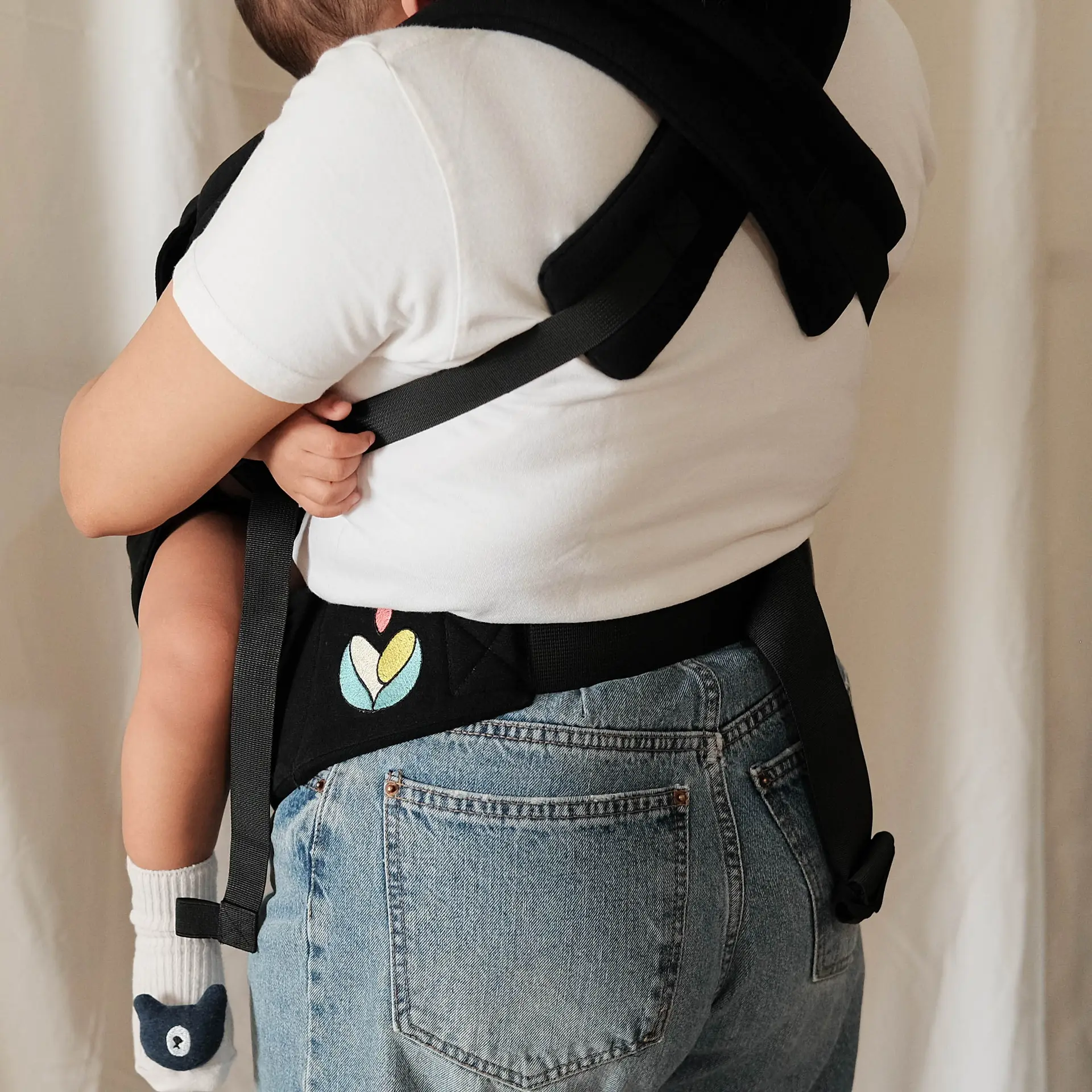 Active parent with baby carrier